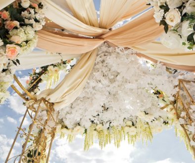 Clothes twined under the top of wedding altar